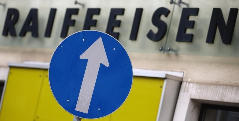 © Reuters. A traffic sign is pictured in front of a Raiffeisen branch office in Vienna