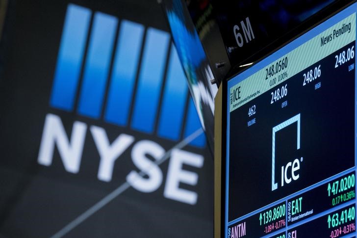 © Reuters. The ticker for Intercontinental Exchange Inc. is displayed on a screen over the post where it is traded on the floor of the New York Stock Exchange