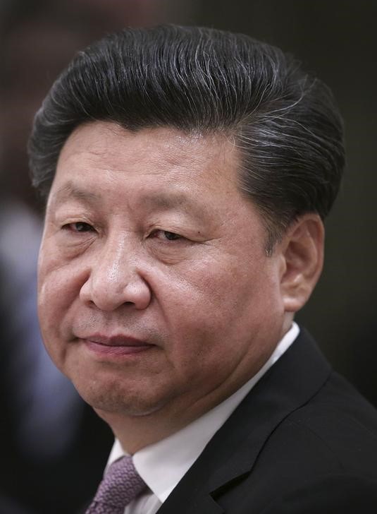 © Reuters. شينخوا:الرئيس الصيني يندد باعدام رهينة صيني على يد تنظيم الدولة الإسلامية