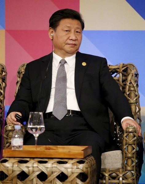 © Reuters. الرئيس الصيني يدين هجوم مالي