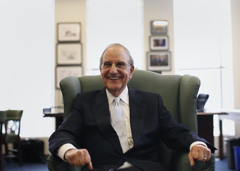 © Reuters. File photo of former US Special Envoy for Middle East Peace and U.S. Senator from Maine George Mitchell smiling during an interview with Reuters in his office in New York