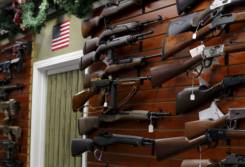 © Reuters. Firearms are shown for sale at the AO Sword gun store in El Cajon