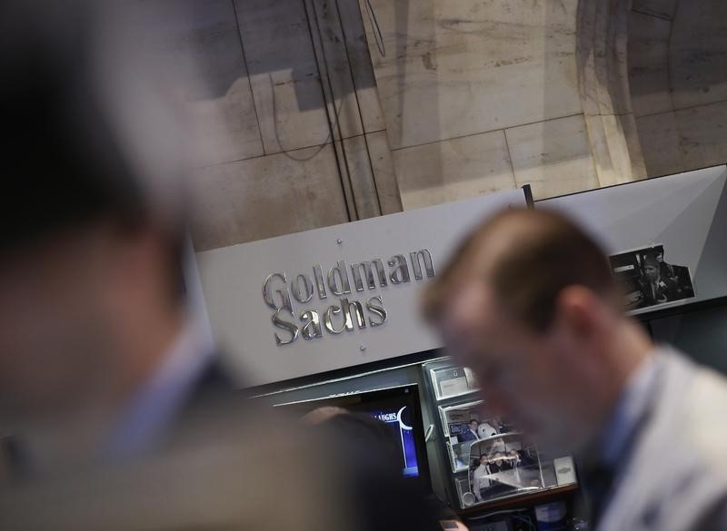 © Reuters. A Goldman Sachs sign is seen over the company's trading stall on the floor at the New York Stock Exchange