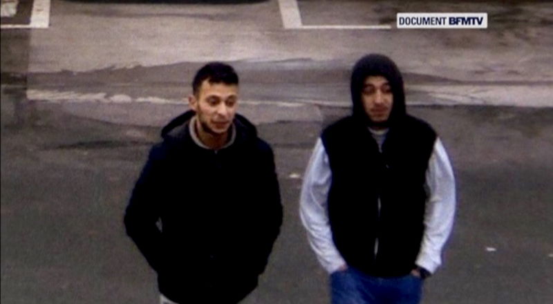 © Reuters. Paris shooting suspect, Salah Abdeslam, and suspected accomplice, Hamza Attou, are seen at a petrol station on a motorway between Paris and Brussels, in Trith-Saint-Leger