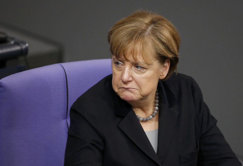 © Reuters. German Chancellor Merkel attends a session of the German lower house of parliament, the Bundestag, in Berlin