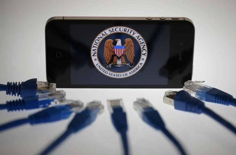 © Reuters. An illustration picture shows the logo of the U.S. National Security Agency on the display of an iPhone in Berlin