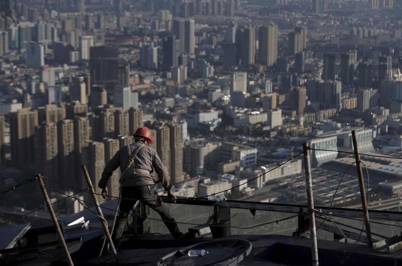 © Reuters. VERS UN RALENTISSEMENT DE LA CROISSANCE CHINOISE AU 4E TRIMESTRE