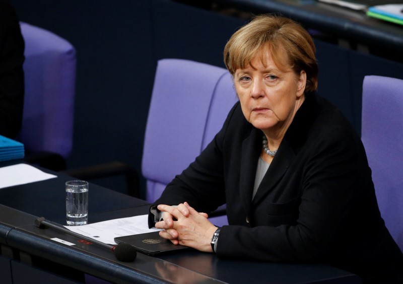 © Reuters. German Chancellor Merkel attends a session of the German lower house of parliament, the Bundestag, in Berlin