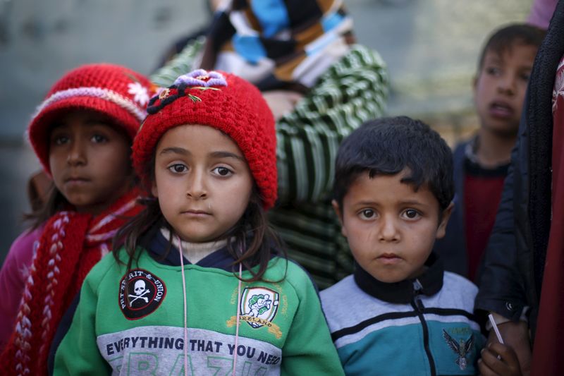© Reuters. الأمم المتحدة: الأطفال السوريون قد يتجمدون حتى الموت في رحلتهم للجوء
