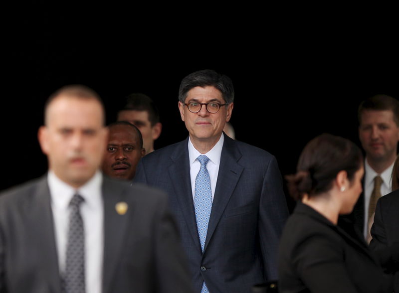 © Reuters. U.S. Treasury Secretary Jack Lew leaves a convention center after holding a meeting with Puerto Rican business people in San Juan