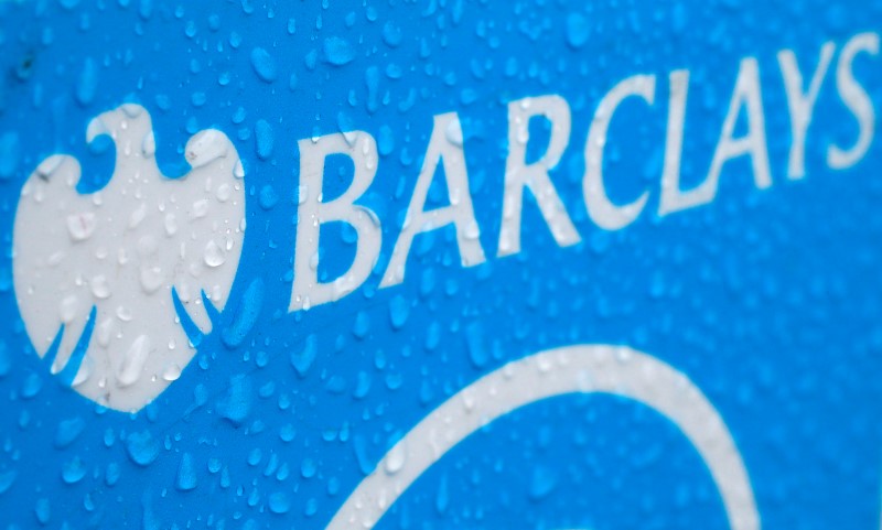© Reuters. Raindrops are seen on the logo of a rental bicycle sponsored by Barclays in London