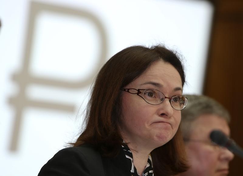 © Reuters. Russia's Central Bank Governor Nabiullina speaks to journalists after announcing official logo of the Russian rouble in Moscow