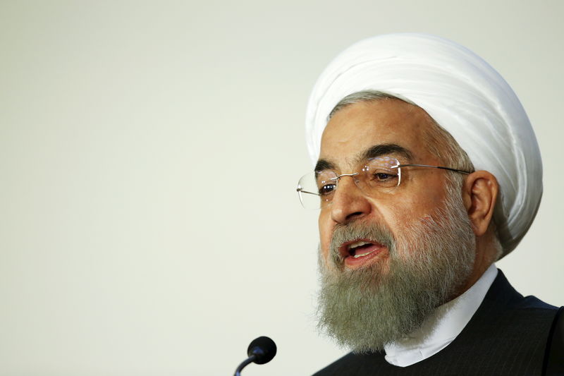 © Reuters. Iran President Hassan Rouhani talks during a business forum in Rome