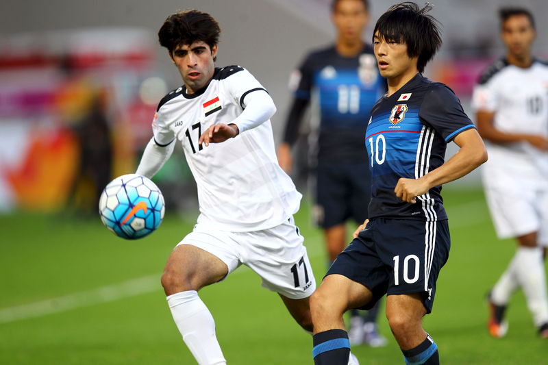 © Reuters. اليابان تتأهل للاولمبياد بهدف قاتل أمام العراق في بطولة آسيا
