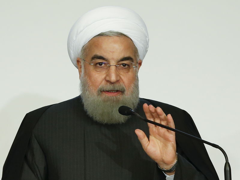 © Reuters. Iran President Hassan Rouhani talks during a business forum in Rome