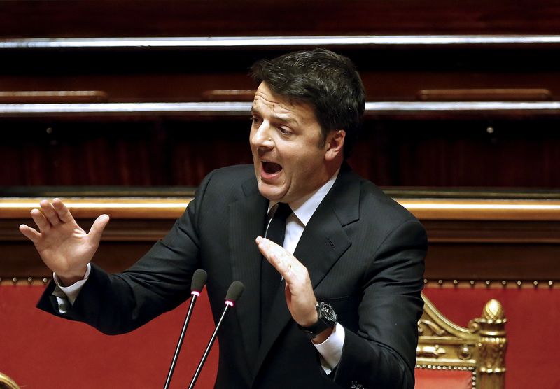 © Reuters. Italian Prime Minister Renzi gestures as he speaks at the Senate in Rome