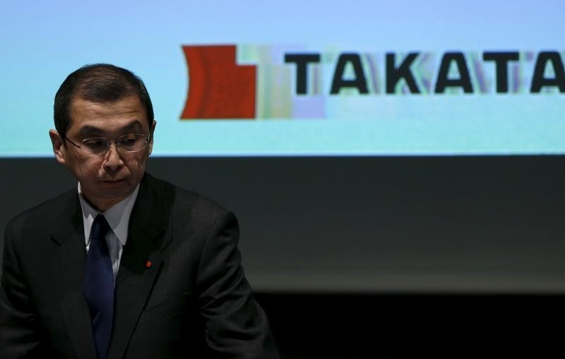 © Reuters. Takata Corp. Chief Executive and President Shigehisa Takada leaves a news conference in Tokyo