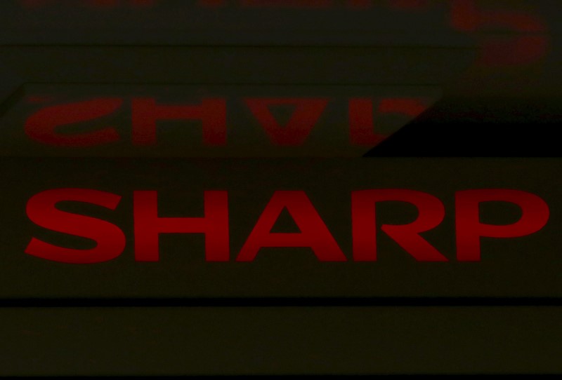 © Reuters. A logo of Sharp Corp is seen on top of its liquid crystal display monitors in Tokyo