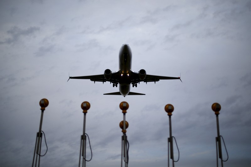 © Reuters. A LAN Airlines plane lands at Santiago International Airport