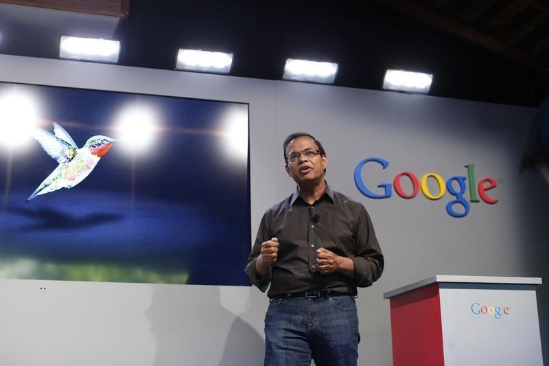 © Reuters. Singhal, senior vice president of search at Google, introduces the new 'Hummingbird' search algorithm  at the garage where the company was founded on Google's 15th anniversary in Menlo Park, California