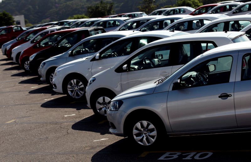 © Reuters. Vehicles sit parked in a lot at a General Motors vehicle factory in Sao Jose dos Campos