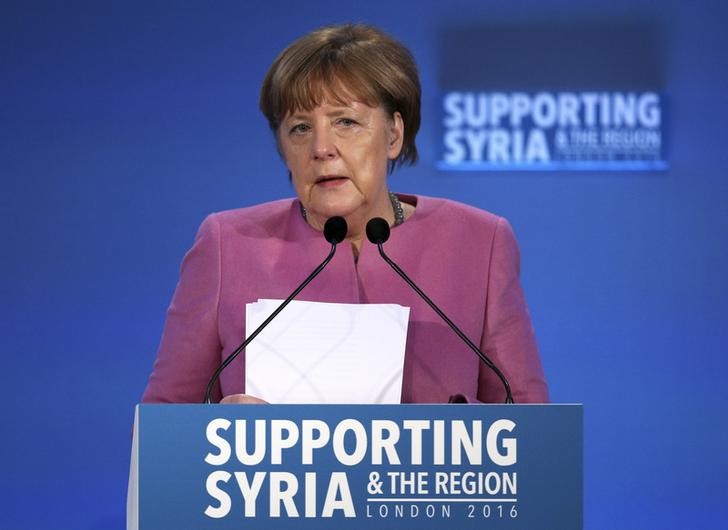 © Reuters. German Chancellor Angela Merkel speaks at the donors Conference for Syria in London