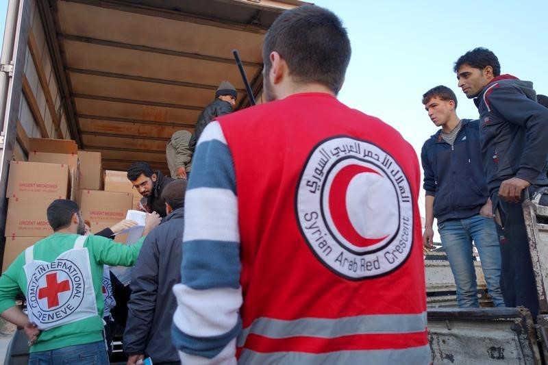 © Reuters. الصليب الأحمر: وصول مساعدات إلى بلدة محاصرة جنوب غرب دمشق