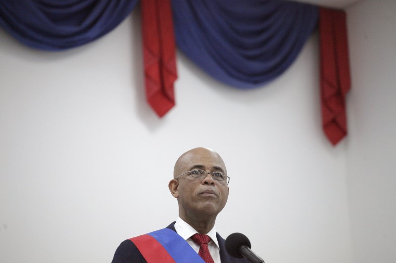 © Reuters. Martelly speaks at a ceremony in Port-au-Prince