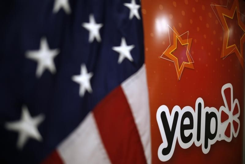 © Reuters. The Yelp Inc. logo is seen in their offices in Chicago, Illinois