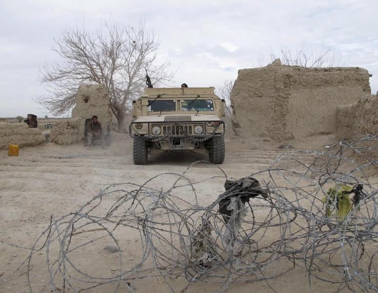 © Reuters. An Afghan National Army vehicle is seen parked at an outpost in Helmand province, Afghanistan 