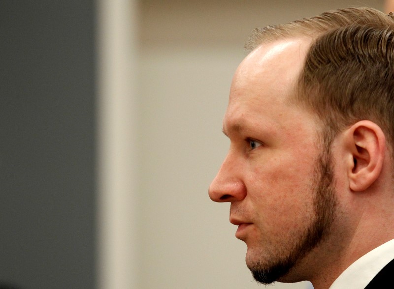 © Reuters. Norwegian mass killer Breivik reacts as he returns after a break to the court room, in Oslo Courthouse