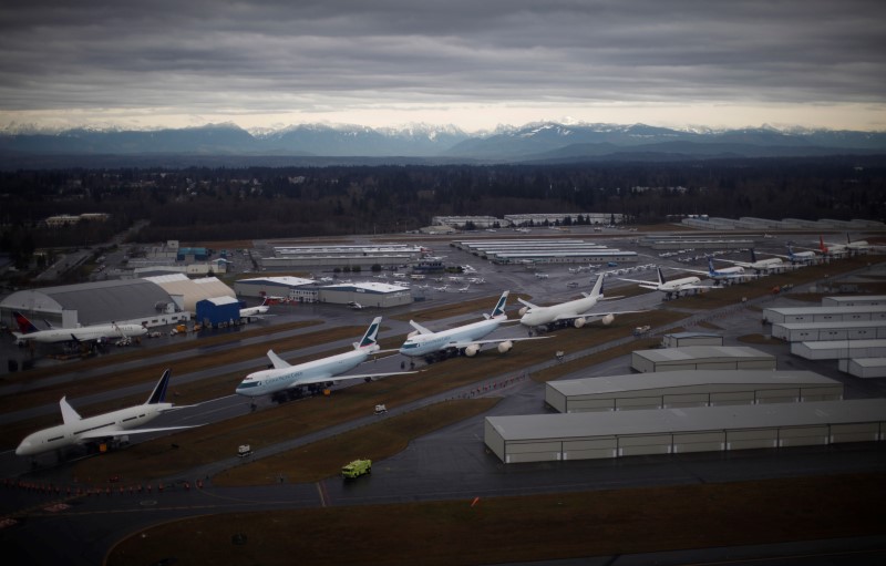 © Reuters. A line-up of Boeing 747s and 787 Dreamliners are pictured at the Boeing production facility in Everett