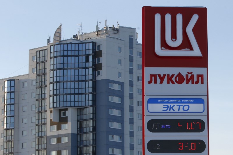 © Reuters. Fuel price board is pictured at Lukoil petrol station in West Siberian city of Kogalym