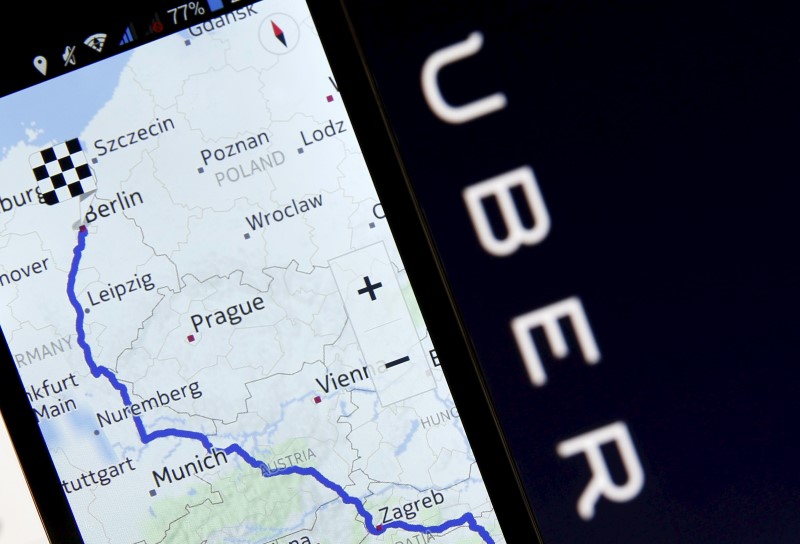 © Reuters. Photo illustration of Nokia Maps on a smartphone in front of a displayed logo of Uber in Zenica