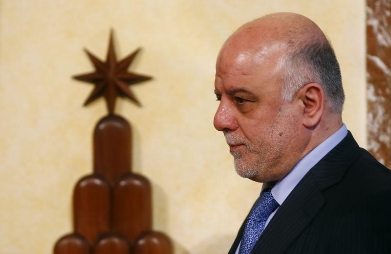 © Reuters. Iraqi Prime Minister Haider Al-Abadi arrives to attend a joint news conference with Italian Prime Minister Renzi at the end of a meeting at Chigi Palace in Rome