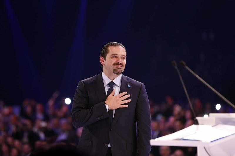 © Reuters. Lebanon's former prime minister al-Hariri gestures during the 10th anniversary of his father's assassination, in Beirut