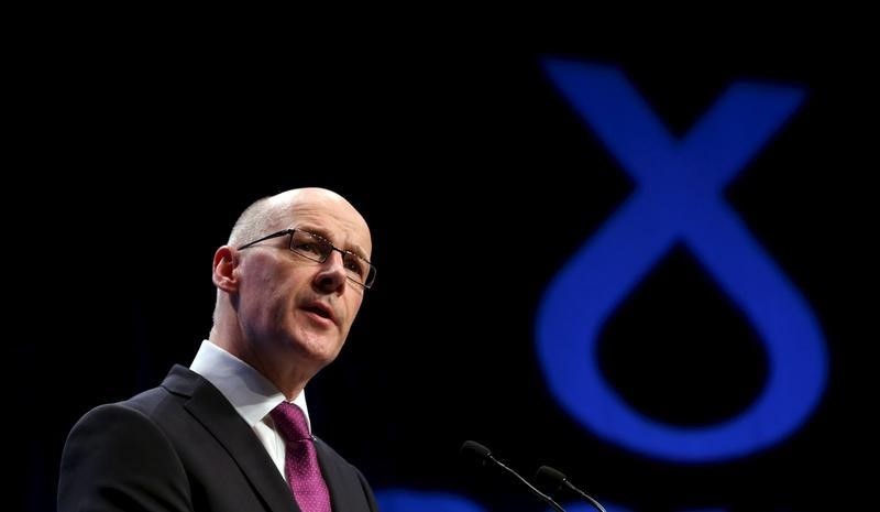 © Reuters. Scotland's Deputy First Minister John Swinney delivers his speech during the party's annual conference in Aberdeen, Scotland