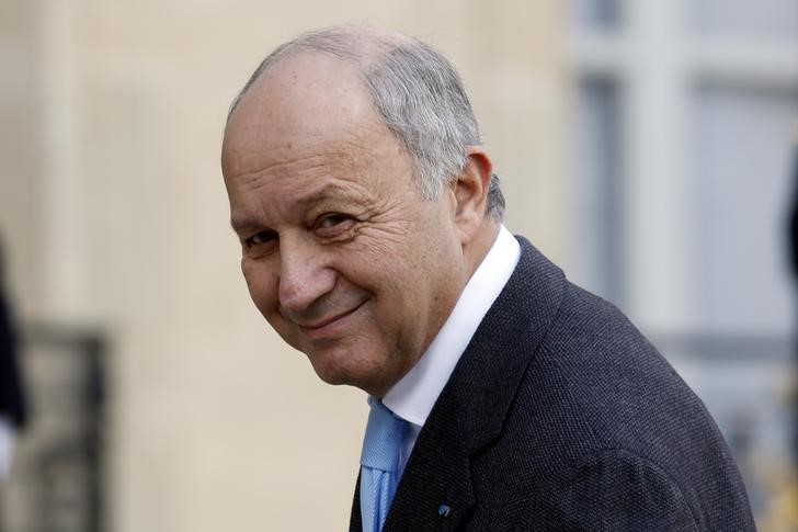 © Reuters. French Foreign Affairs Minister Laurent Fabius arrives at the Elysee Palace in Paris