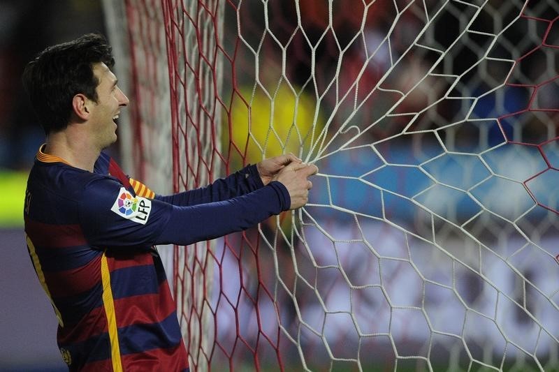 © Reuters. Messi durante jogo do Barcelona contra Sporting Gijón