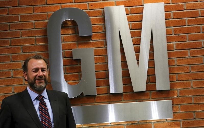 © Reuters. Ammann, President of General Motors, poses after a news conference in Sao Paulo 