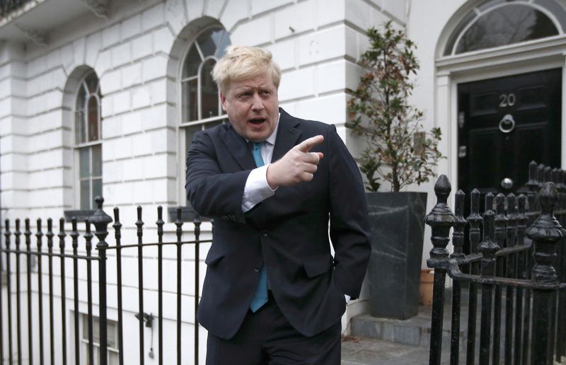 © Reuters. London Mayor Boris Johnson prepares to speak to the media in front of his home in London
