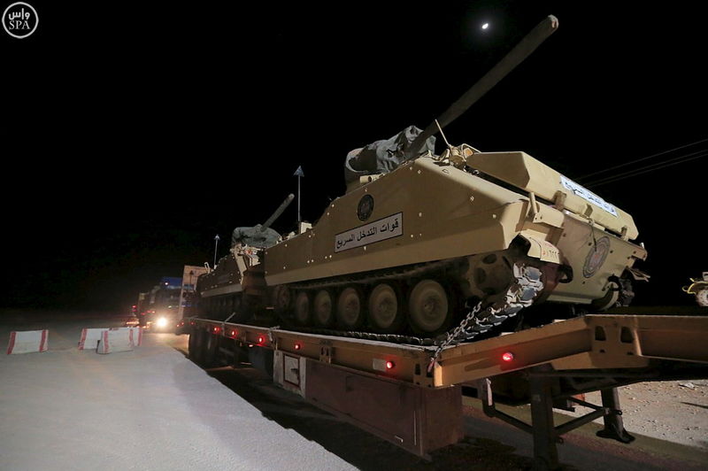 © Reuters. Saudi Press Agency handout photo shows armoured vehicles as troops arrive to participate in joint military exercises in Hafr Al-Batin