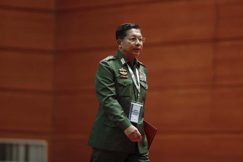 © Reuters. Hlaing arrives to give a speech in Naypyitaw 