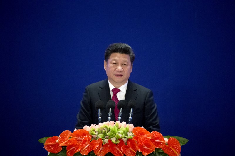 © Reuters. Chinese President Xi Jinping speaks during the opening ceremony of the Asian Infrastructure Investment Bank (AIIB) in Beijing,