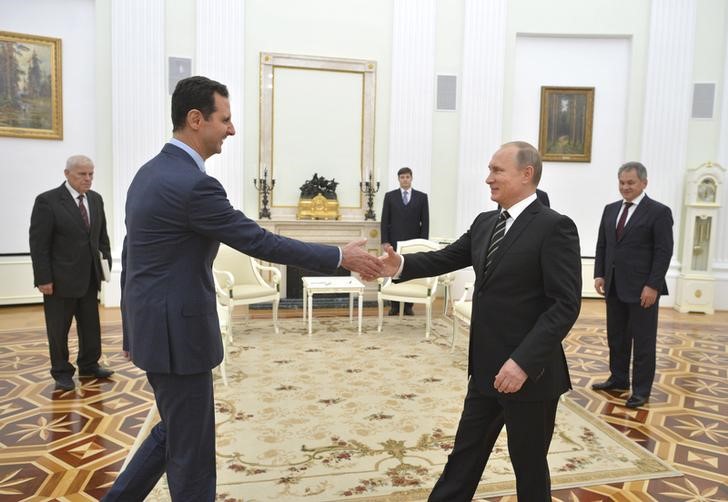 © Reuters. Asad dice a Putin que su gobierno facilitará el alto el fuego en Siria 