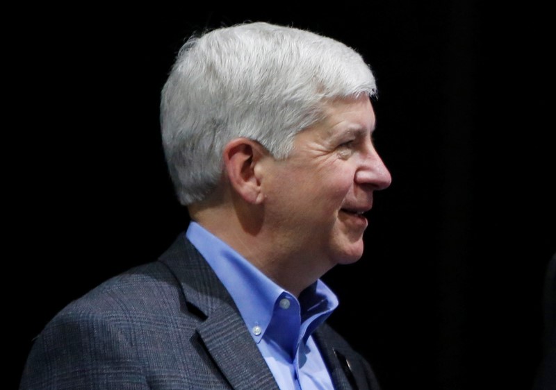 © Reuters. File photo of Michigan Governor Snyder speaking during the official launch of VLF Automotive at the North American International Auto Show in Detroit