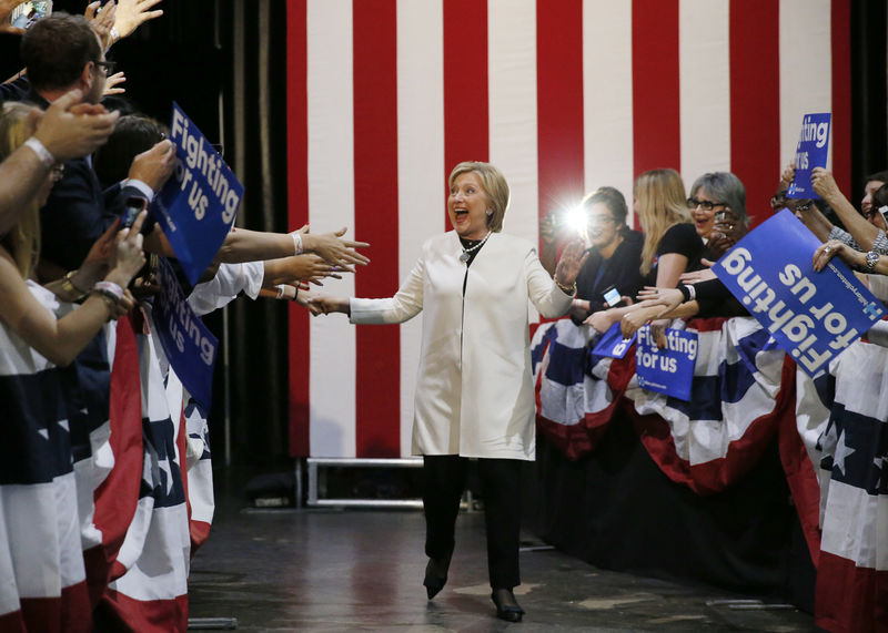 © Reuters. U.S. presidential candidate Hillary Clinton arrives at her Super Tuesday primary night party in Miami Florida