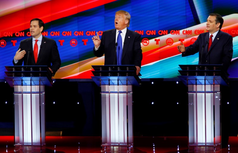 © Reuters. Republican U.S. presidential candidates U.S. Senator Marco Rubio, Donald Trump and Senator Ted Cruz speak at the debate sponsored by CNN for the 2016 Republican U.S. presidential candidates in Houston