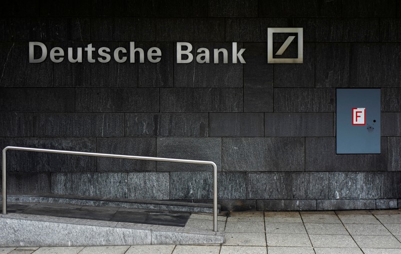 © Reuters. A fire hydrant is seen next to the logo of Germany's Deutsche Bank in Frankfurt