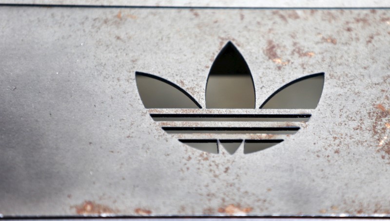 © Reuters. The Adidas logo on an iron bench is pictured at the flagship store in Berlin